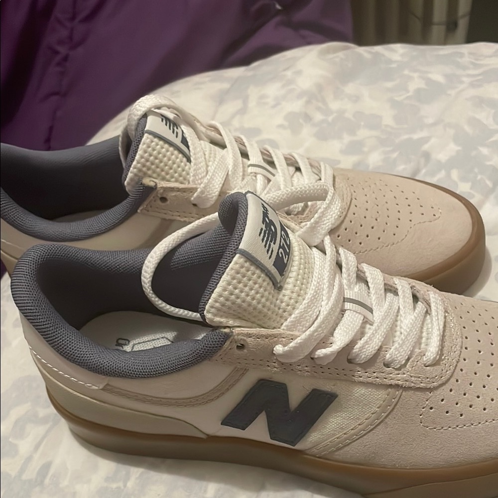 New Balance White and Gray Classic Sneakers